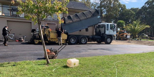 This is a photo of an asphalt driveway which is in the process of being installed by Renmark Road Tech SA